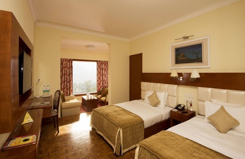 Pudumund Hotel | Relax at Gem Park Ooty: Family-Friendly with Spa & Pool