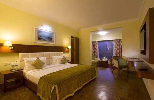 Pudumund Hotel | Relax at Gem Park Ooty: Family-Friendly with Spa & Pool