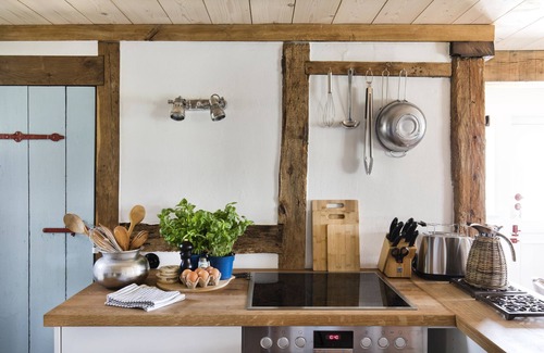 Damp House | Revkuhl: Historic Charm with Ocean Views and Garden Bliss