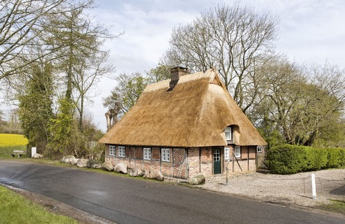 Damp House | Revkuhl: Historic Charm with Ocean Views and Garden Bliss