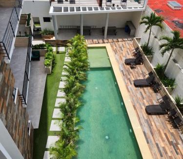Cancun Apartment | Gema 302: Family-Friendly Retreat with Pool and Hot Tub