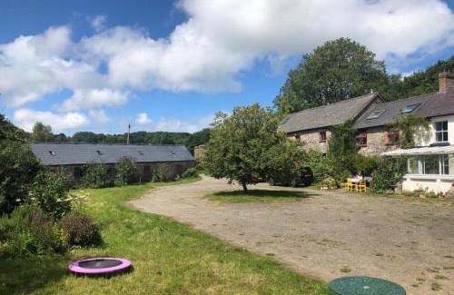 Coed Y Bryn House | Discover Gernos Farmhouse: 4-Star Stay with Pet-Friendly Perks