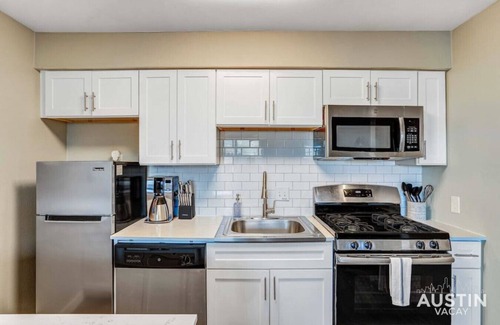 Hancock Apartment | Relax in Central ATX: Cozy Memory Foam Beds Await You