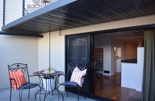 West Hobart Apartment | Experience the Funky Den: Your Spa Retreat in Hobart