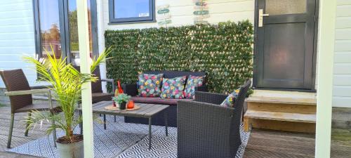 Menaldum Apartment | Cozy Chalet with Oceanfront Views and Private Garden