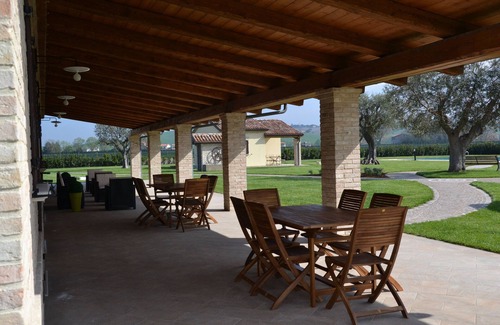 Mondolfo Apartment | GIGLIO: Poolside Apartment Just 5 Minutes from the Sea