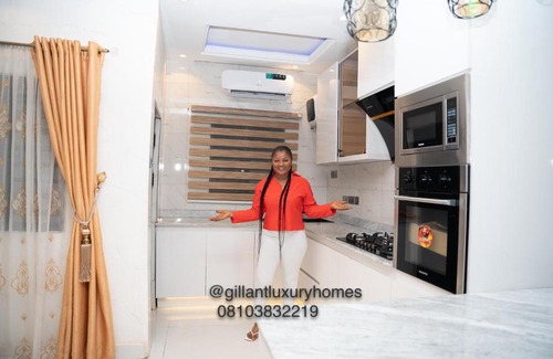 Benin City Apartment | Gillant Homes: Family-Friendly Stay with Pool & Hot Tub
