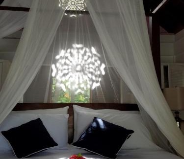 Mount Pleasant Bay Hotel | Relax at Gingerbread Suites: Oceanfront Bliss Awaits