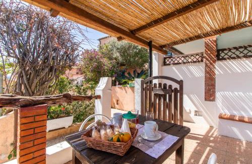 Capo Testa Apartment | Giovanni: Pet-Friendly Retreat with Oceanfront Views