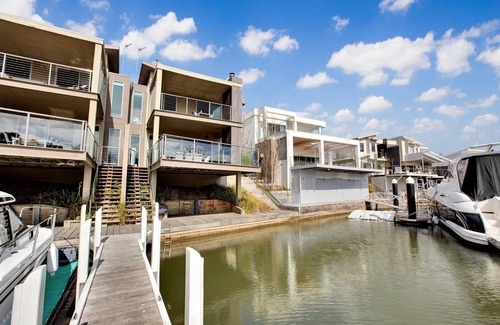 Paynesville House | Elegant Canal Retreat with Private Jetty & Lake Views