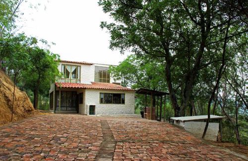 Girardot House | Discover Girardot Cabañas - Balcón de Guabinal Retreat