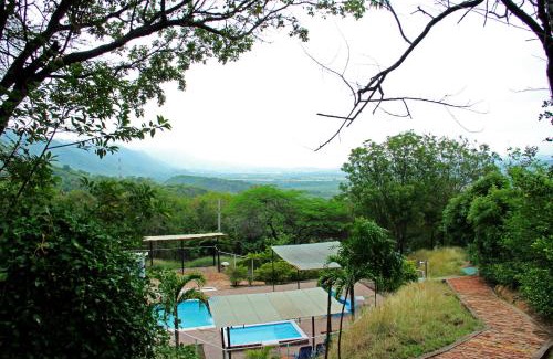 Girardot House | Discover Girardot Cabañas - Balcón de Guabinal Retreat