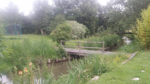Colleville Apartment | Child-Friendly Retreat at Gite de l'Ancien Moulin