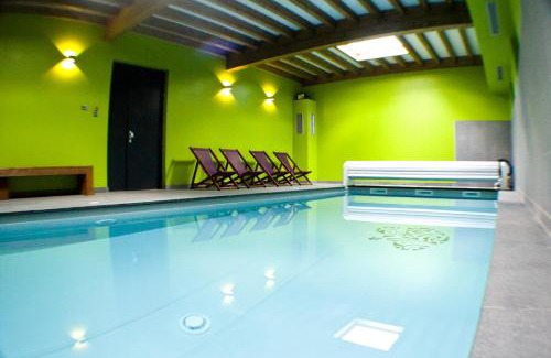 Rochesson Apartment | Relax at Gite Roche Des Ducs with Year-Round Pool & Spa