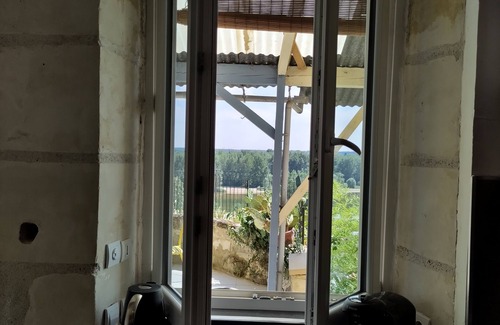 Rochecorbon Cottage | Idyllic Gite Troglodyte Atypique with Loire View & Breakfast