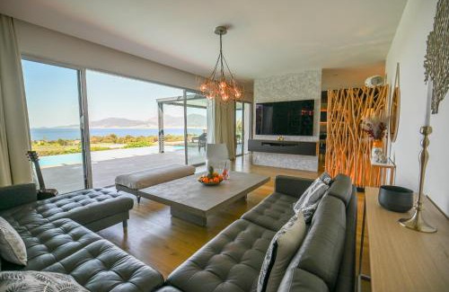 Grosseto-Prugna Villa | Elegant Villa Giulia with Ocean View Pool in Porticcio