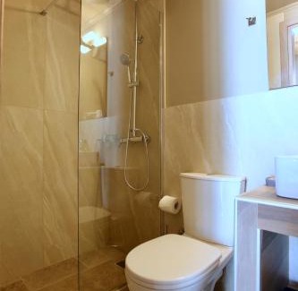 Markopoulon Apartment | Family-Friendly GK Mediterranean Village with Free Airport Shuttle