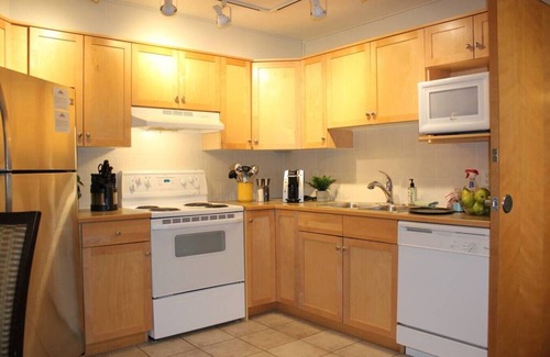 Canmore Condo | Unforgettable Glacier Winds with Mountain Views & Gym Access