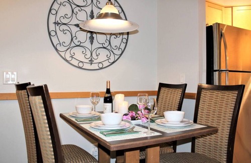 Canmore Condo | Unforgettable Glacier Winds with Mountain Views & Gym Access