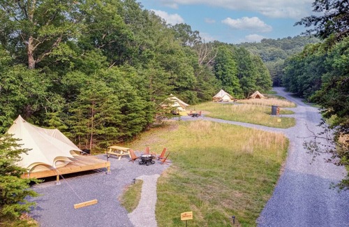 Great Cacapon RV Rental | Unique Glamping Experience at Firefly Ridge - Hemlock King Bed