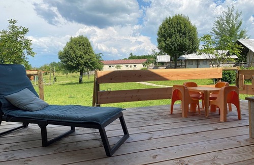 Jayac RV Rental | Glamping 'Safarilodge Confort Tent 8 5 Pers' with Shared Pool, Private Terrace and Wi-Fi