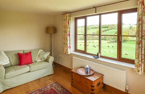 Coed-Y-Paen House | Family-Friendly Glebe Farm Cottage with High Guest Ratings