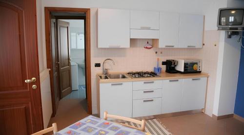 Cenesi Apartment | Discover Gli Angeli: Family-Friendly Retreat with Pool