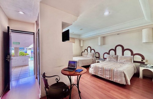 Cuautlancingo Hotel | Discover Global Express Puebla: Family-Friendly Retreat