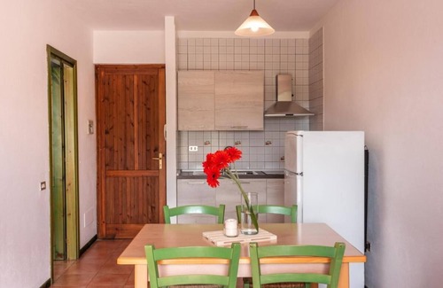 Santa Teresa di Gallura Apartment | Inviting Residence Le Pavoncelle Studio with Pool & Kitchen