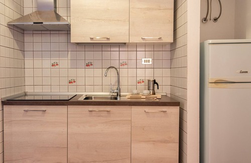 Santa Teresa di Gallura Apartment | Inviting Residence Le Pavoncelle Studio with Pool & Kitchen