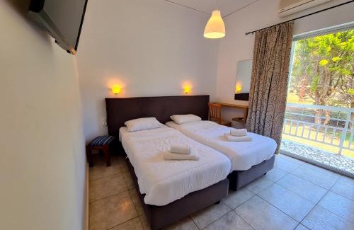 Pineios Hotel | Experience Glyfa Beach Hotel with Oceanfront Views