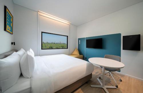 Si Racha Hotel | Cozy GO! Hotel Si Racha: Pet-Friendly & Family Accommodations