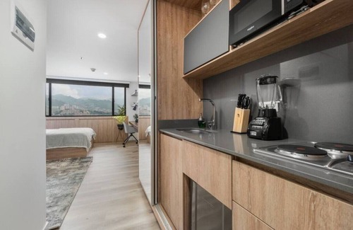 Guayabal Apartment | Inviting Loft with Kitchenette & AC for Remote Work