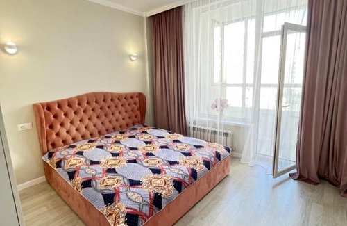 Nur-Sultan Apartment | Unforgettable Stay in Sat City - Rated 10/10 & Family-Friendly