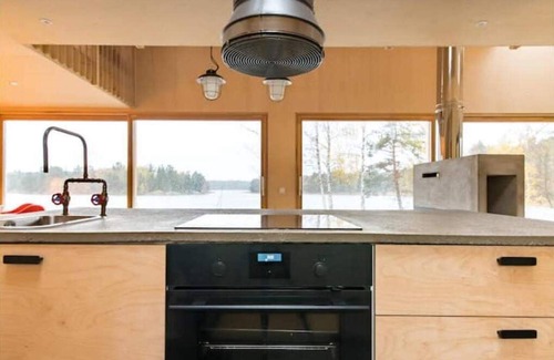 Skalvik House | GODA: Serene Island Hideaway with Oceanfront Oasis