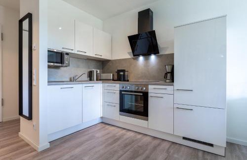 Alt-Travemunde/Ronnau Apartment | Well-Reviewed Godewindpark Travemünde: Family-Friendly Stay