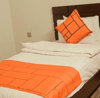 Gulshan-E-Jamal Hotel | Budget-Friendly Stay at GOHO Airport with Breakfast Included
