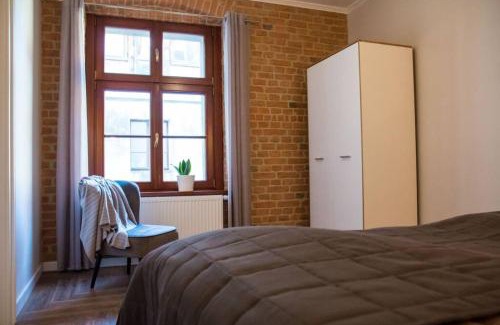 Stare Miasto Apartment | Pet-Friendly Gold Garden by Rentoom: Rated 9.1/10