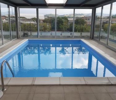 Maranello Apartment | Gold House: 4-Star Oceanfront Retreat with Pool & Breakfast