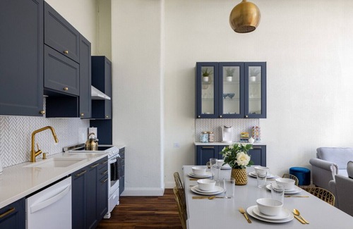 West Main Historic District Condo | Gold Suite by Hollyhock: Executive Living with Pet-Friendly Amenities