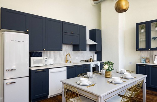 West Main Historic District Condo | Gold Suite by Hollyhock: Executive Living with Pet-Friendly Amenities