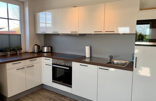 Albertsdorf Apartment | Goldblick apartment with wood-burning stove, garden and proximity to the sandy beach on Fehmarn