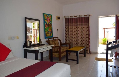 Uppuveli Hotel | Budget-Friendly Golden Beach Cottages with Family Amenities