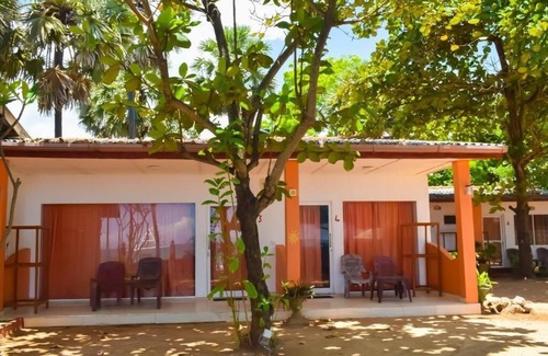 Uppuveli Hotel | Budget-Friendly Golden Beach Cottages with Family Amenities