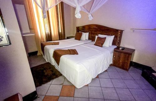 Livingstone Hotel | Golden Days Lodge: Oceanfront Retreat with Pool Access