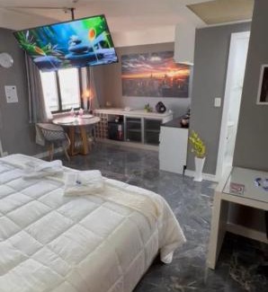 Guarulhos City Centre Apartment | Golden Flat's - Slaviero Guarulhos: Pet-Friendly Getaway