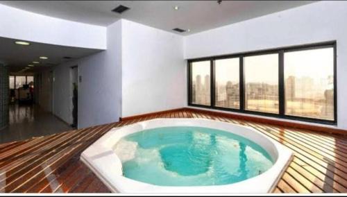 Guarulhos City Centre Apartment | Golden Flat's - Slaviero Guarulhos: Pet-Friendly Getaway