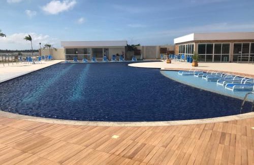 Arraial do Cabo Apartment | Golden Lake Residence: Oceanfront Retreat with Spa & Pool