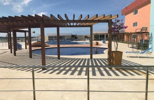 Arraial do Cabo Apartment | Golden Lake Residence: Oceanfront Retreat with Spa & Pool