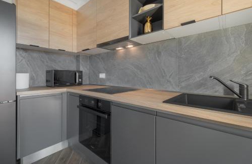 Oradea Apartment | Golden Noir Retreat
